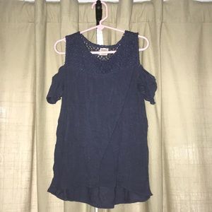 A cold shoulder top with a lace upper back part.